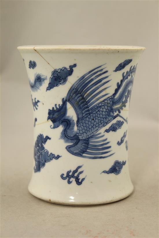 A Chinese blue and white waisted brush pot, Jiajing mark, Kangxi period, 13cm., broken and re-stuck